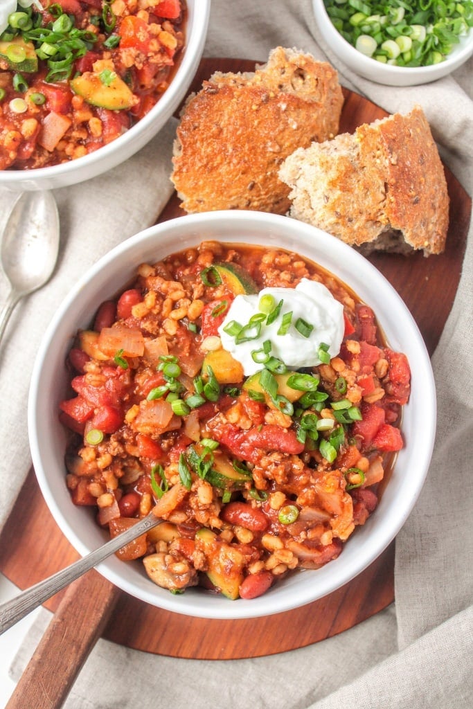 flat lay photo of barley chili with turkey and veggies