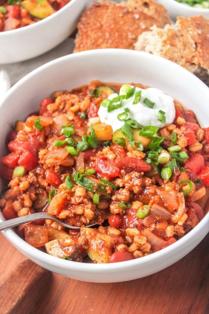 close up of turkey barley soup in a bowl