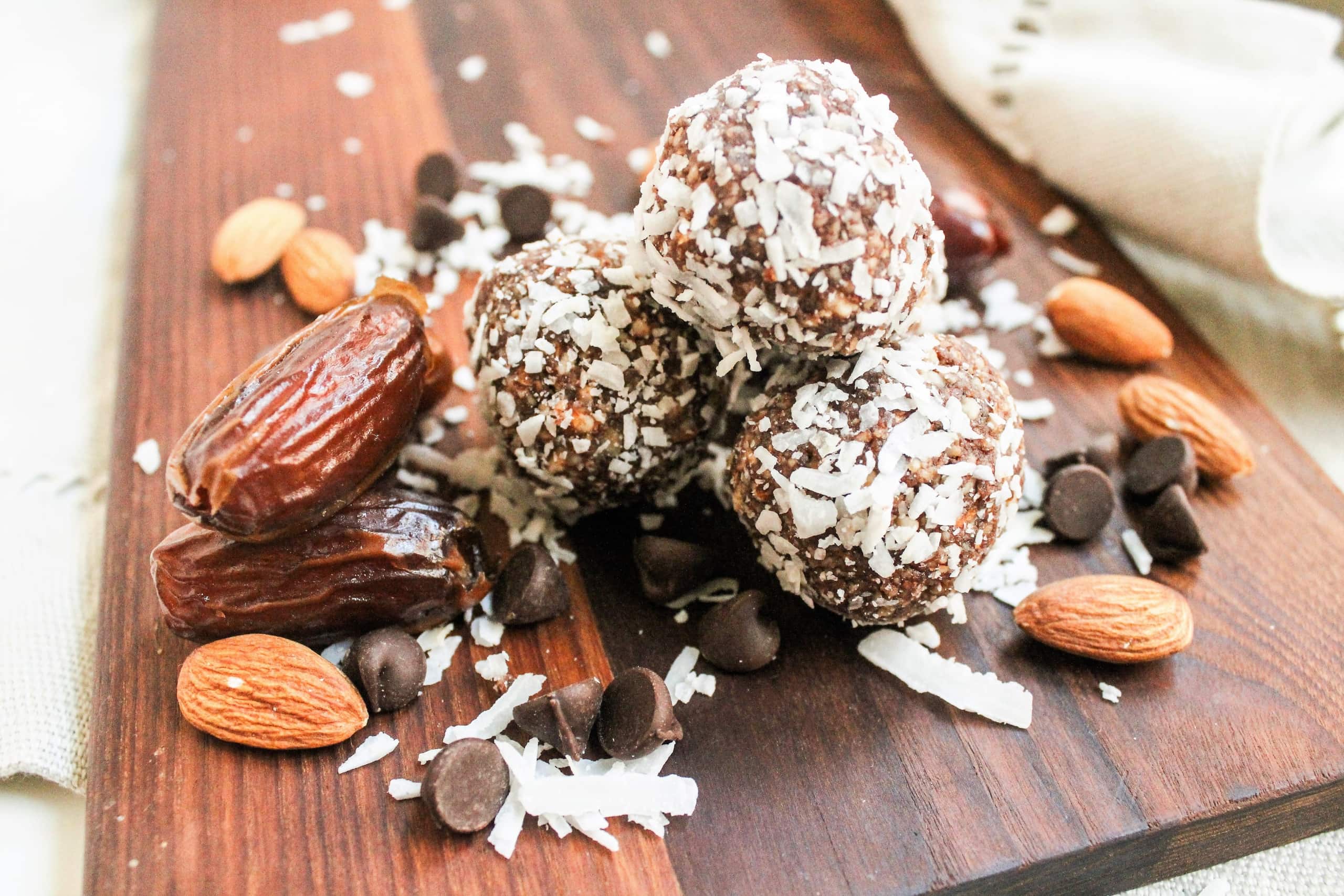 chocolate coconut date bliss balls with almonds