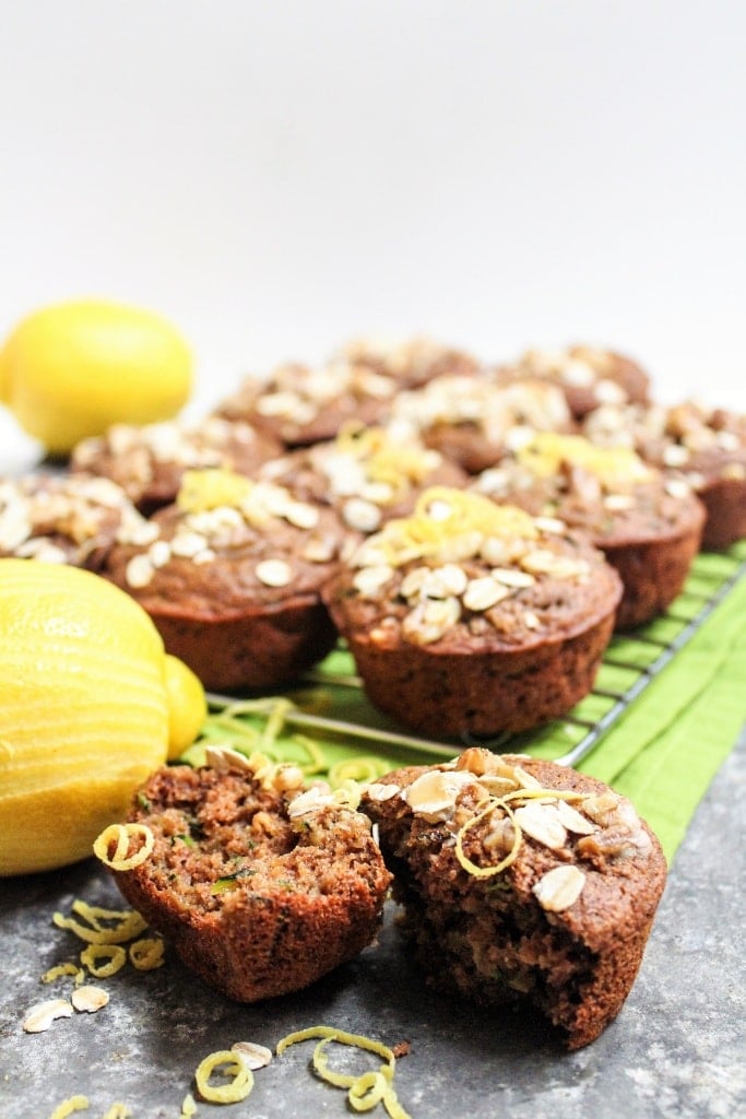 whole wheat lemon zucchini muffins on a wire rack