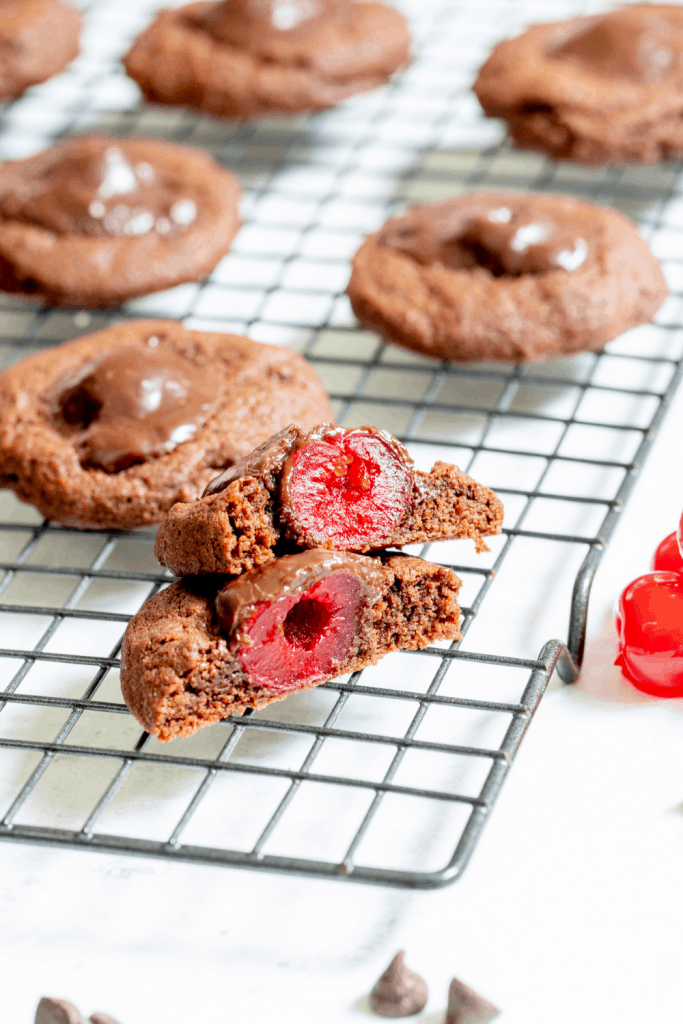 chocolate covered cherry cookies on a wire rack