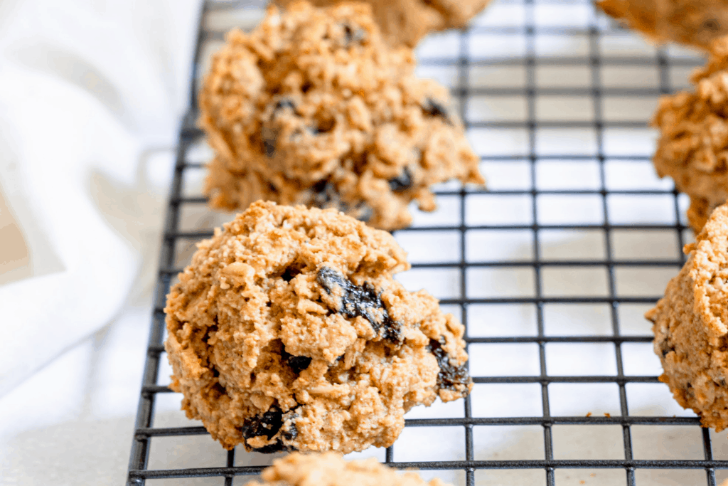 vegan oatmeal raisin cookies on a wire cooling rack