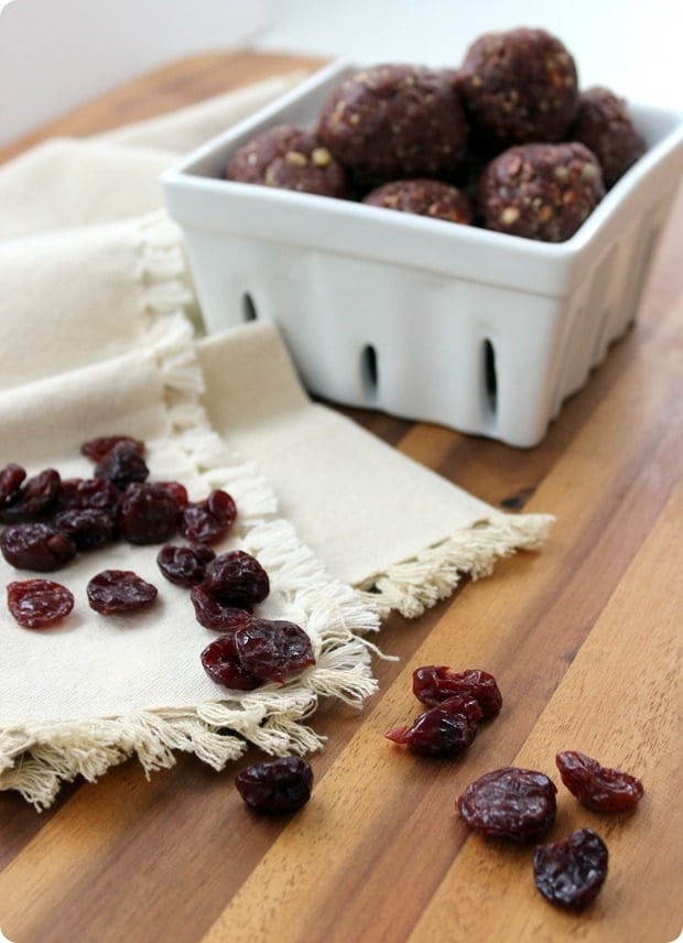 no bake cherry bites in a white bowl with tart cherries scattered around