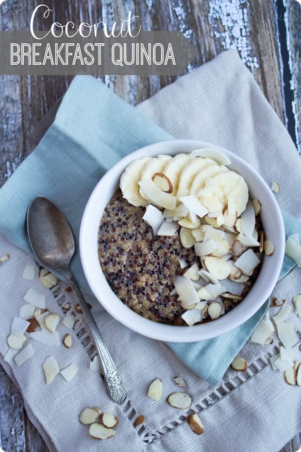breakfast quinoa bowl with coconut, banana slices, and sliced almonds