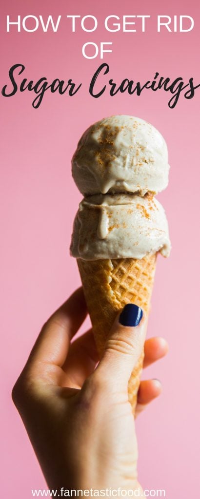 what causes sugar cravings and how to stop them: woman holding ice cream cone