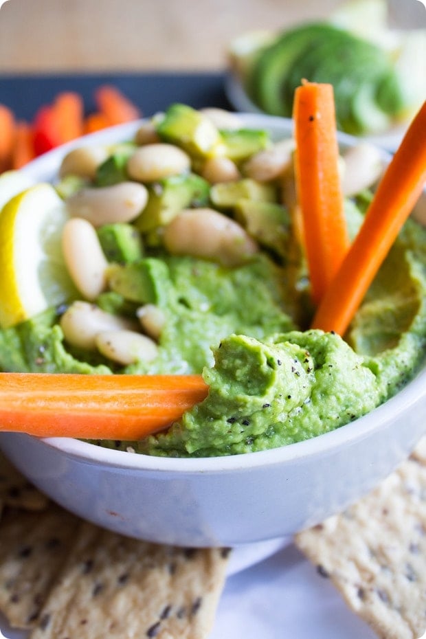 lemon avocado hummus with carrot sticks