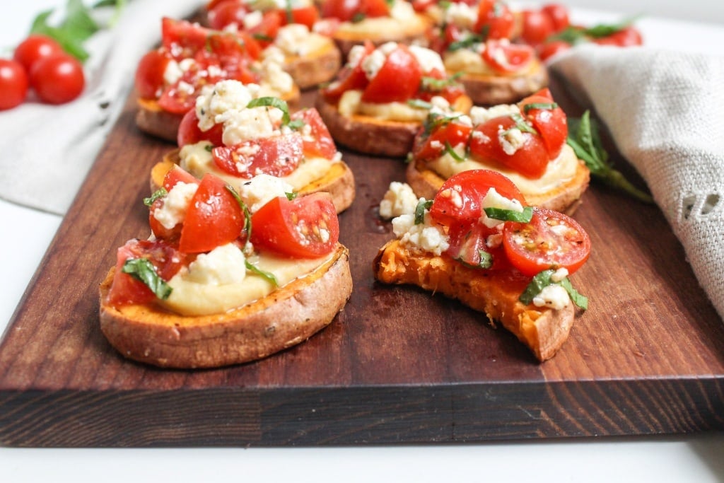 appetizer bites on a wooden platter