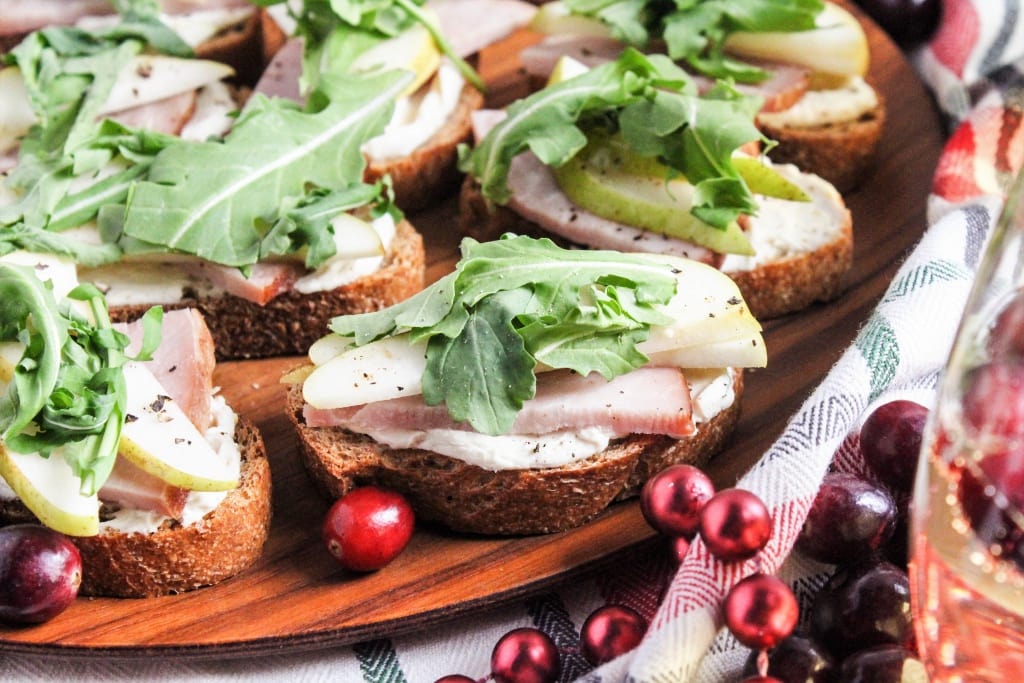 ham and pear crostini appetizer with goat cheese