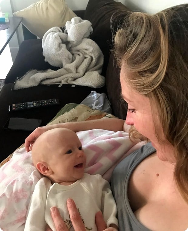 baby smiles with mommy 2