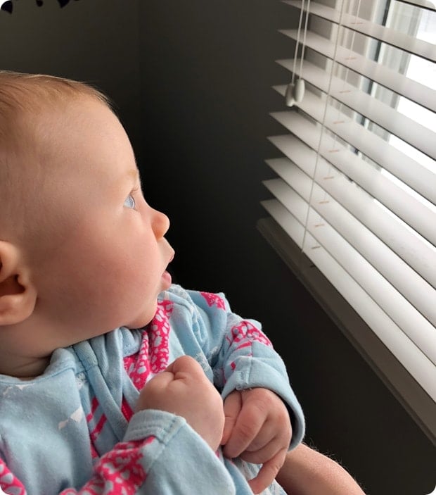 baby watching the snow