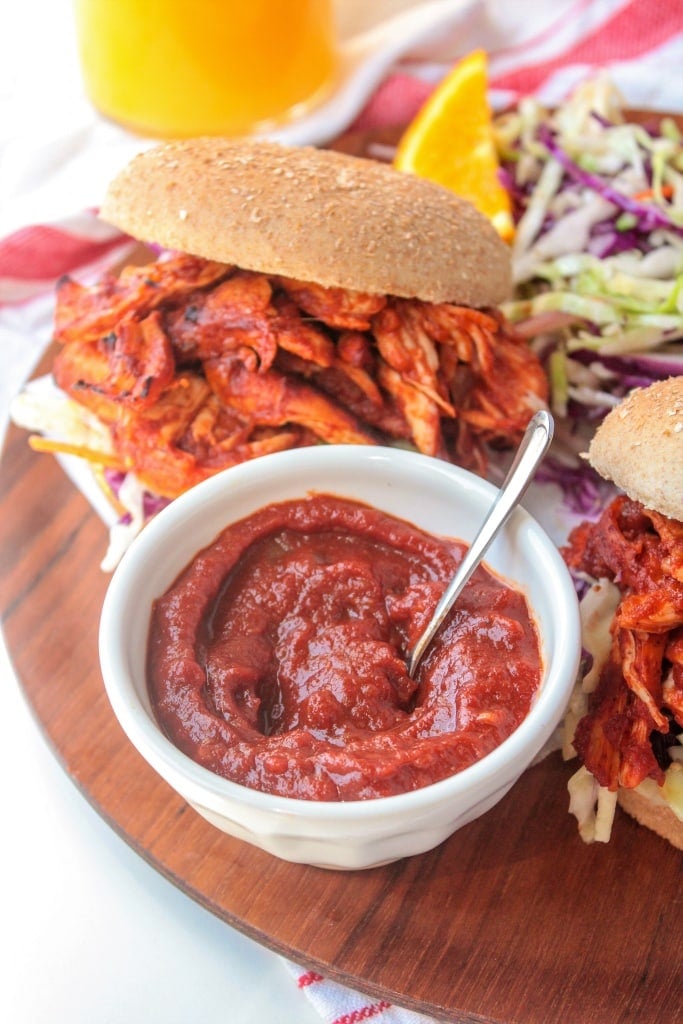 These Orange Juice BBQ Chicken Sandwiches are perfect for your next summer cookout -- the Florida Orange Juice BBQ sauce is tangy and flavorful without loads of added sugar! 