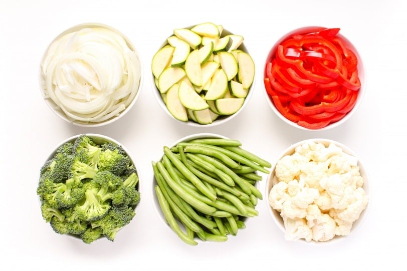 raw vegetables in small bowls