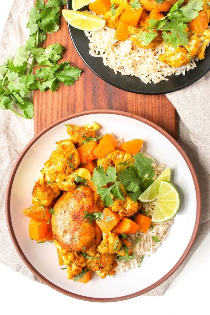 maple curry sheet pan chicken and veggies on a plate