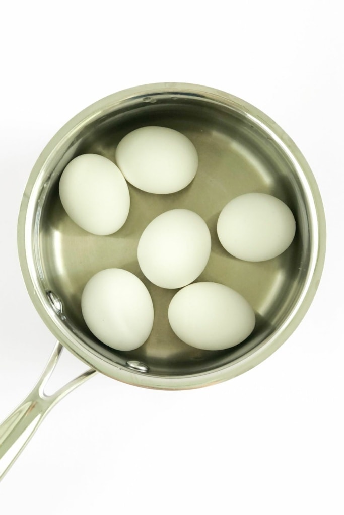 boiled eggs in a small metal pot