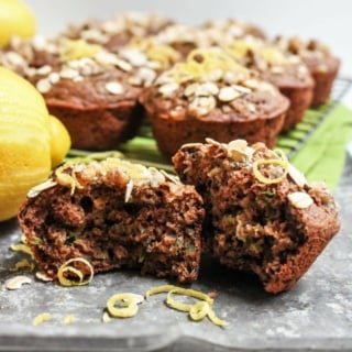 vegan zucchini muffins with lemon zest and oats on top