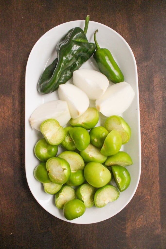 tomatillos, poblano peppers, jalapeno peppers, and white onion
