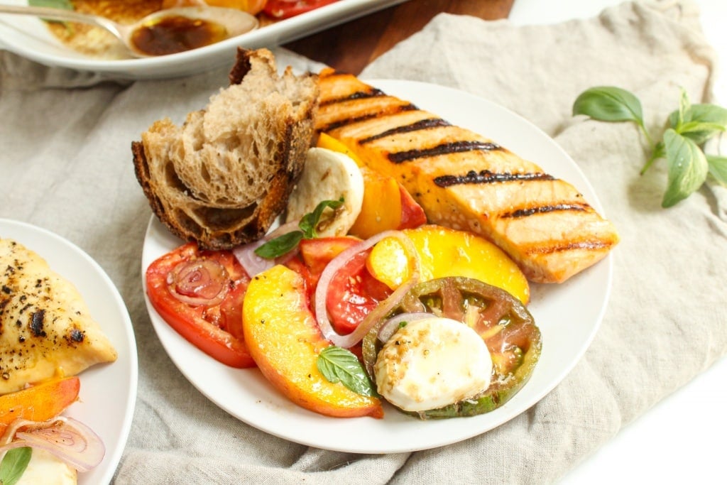heirloom tomato peach caprese salad with grilled salmon