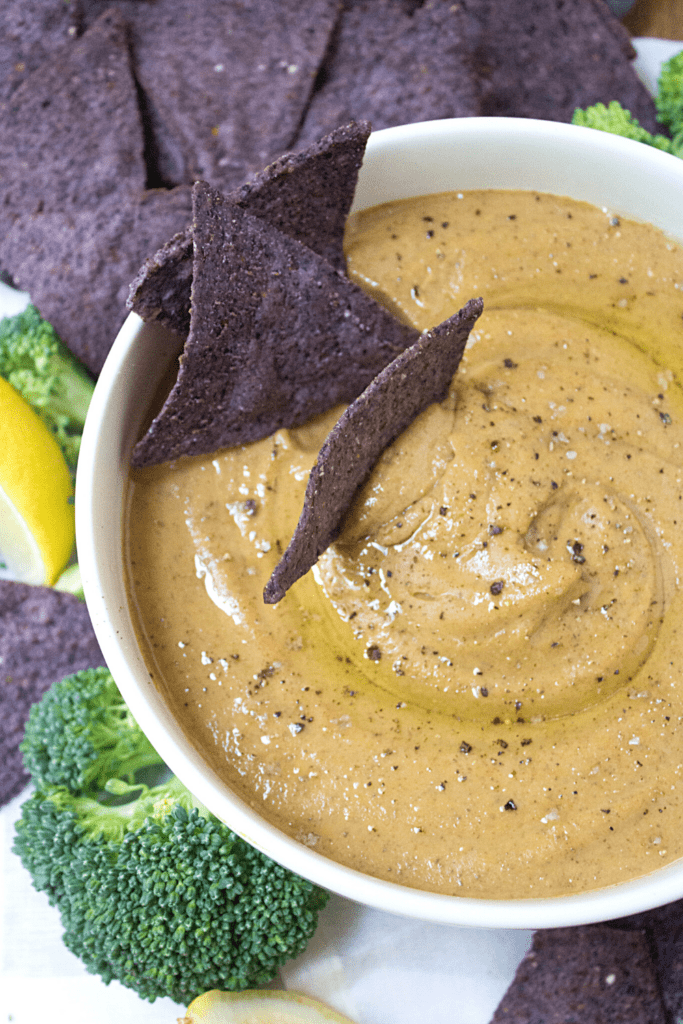 pumpkin dip with purple tortilla chips