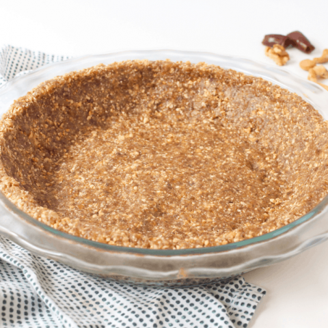 vegan pie crust in a glass dish