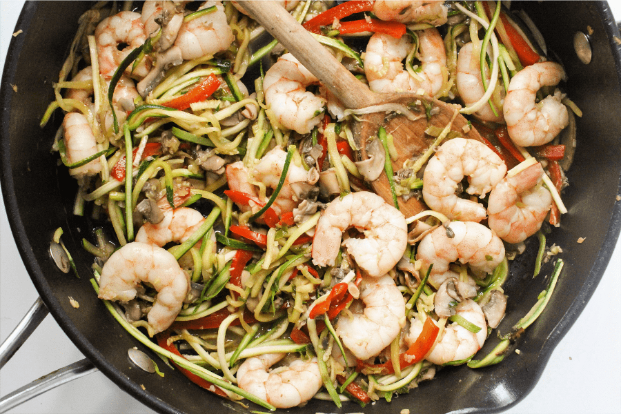 shrimp and vegetables in a skillet