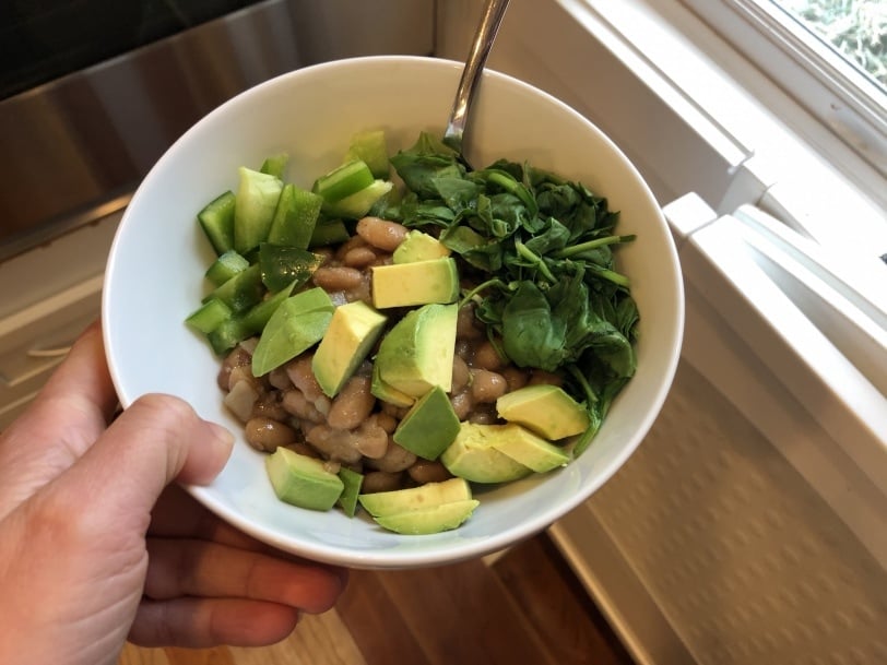rice and beans with avocado and spinach