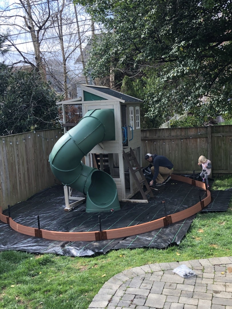 putting a border around an outdoor playhouse