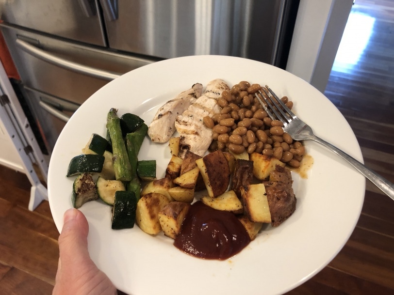 leftover grilled chicken with baked beans, roasted potatoes, and veggies
