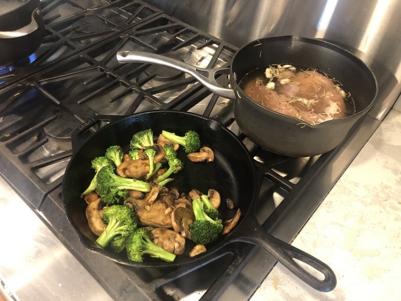broccoli and mushrooms cooking on the stove