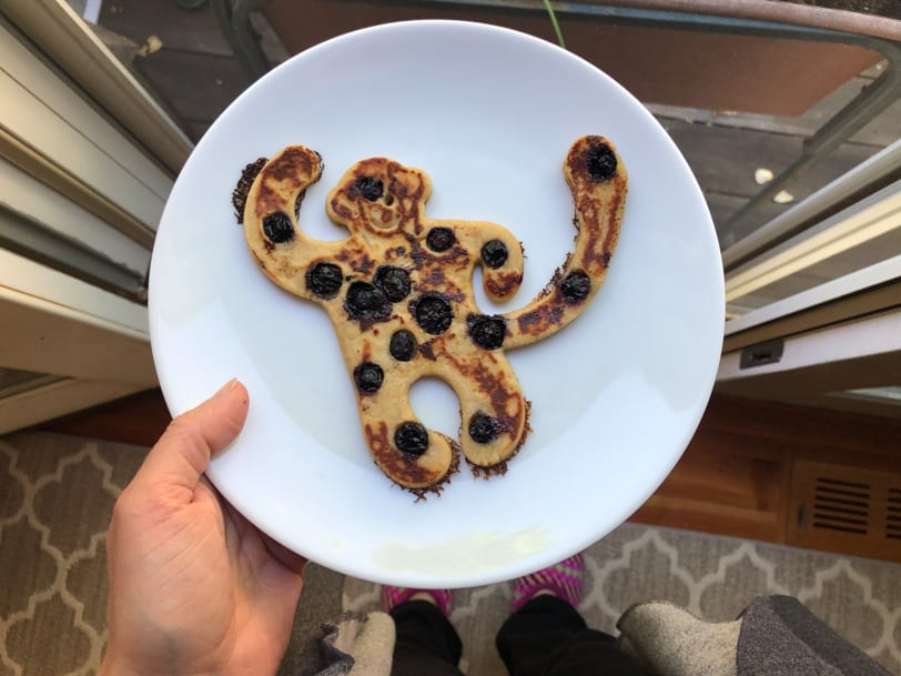 blueberry pancake in the shape of a monkey