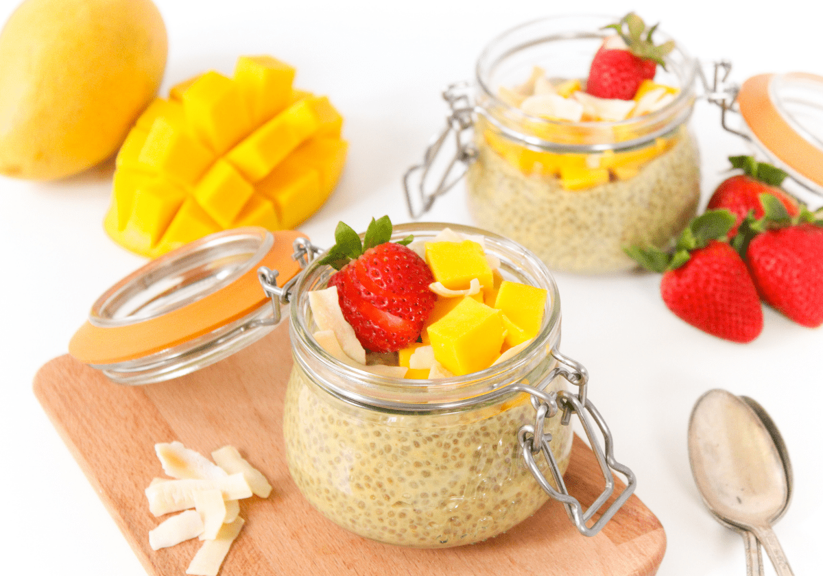 mango chia pudding with coconut milk and strawberries
