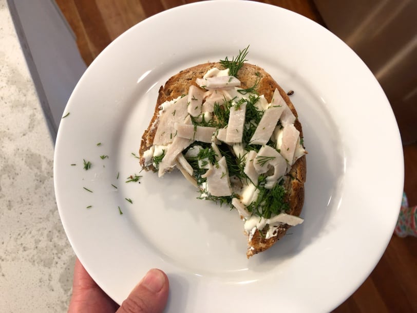 bagel with cream cheese, dill, and turkey