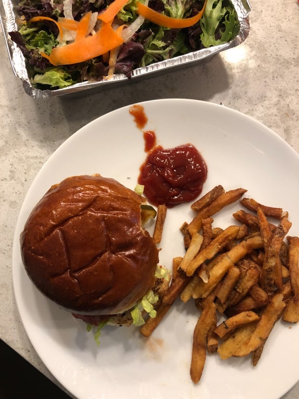burger, fries, and salad from liberty tavern