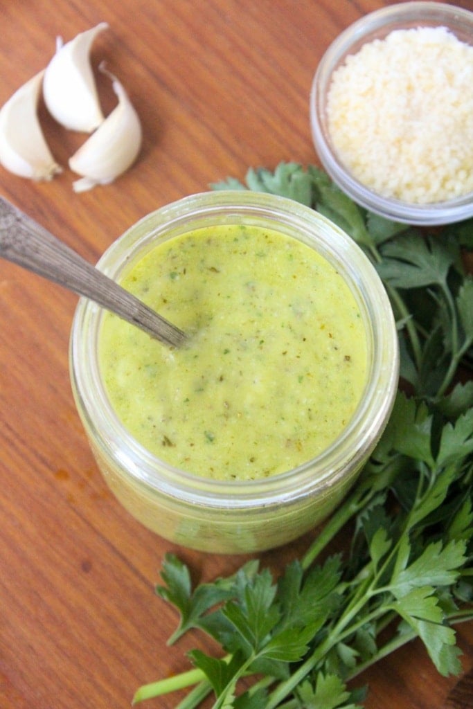 creamy Italian dressing in a small jar