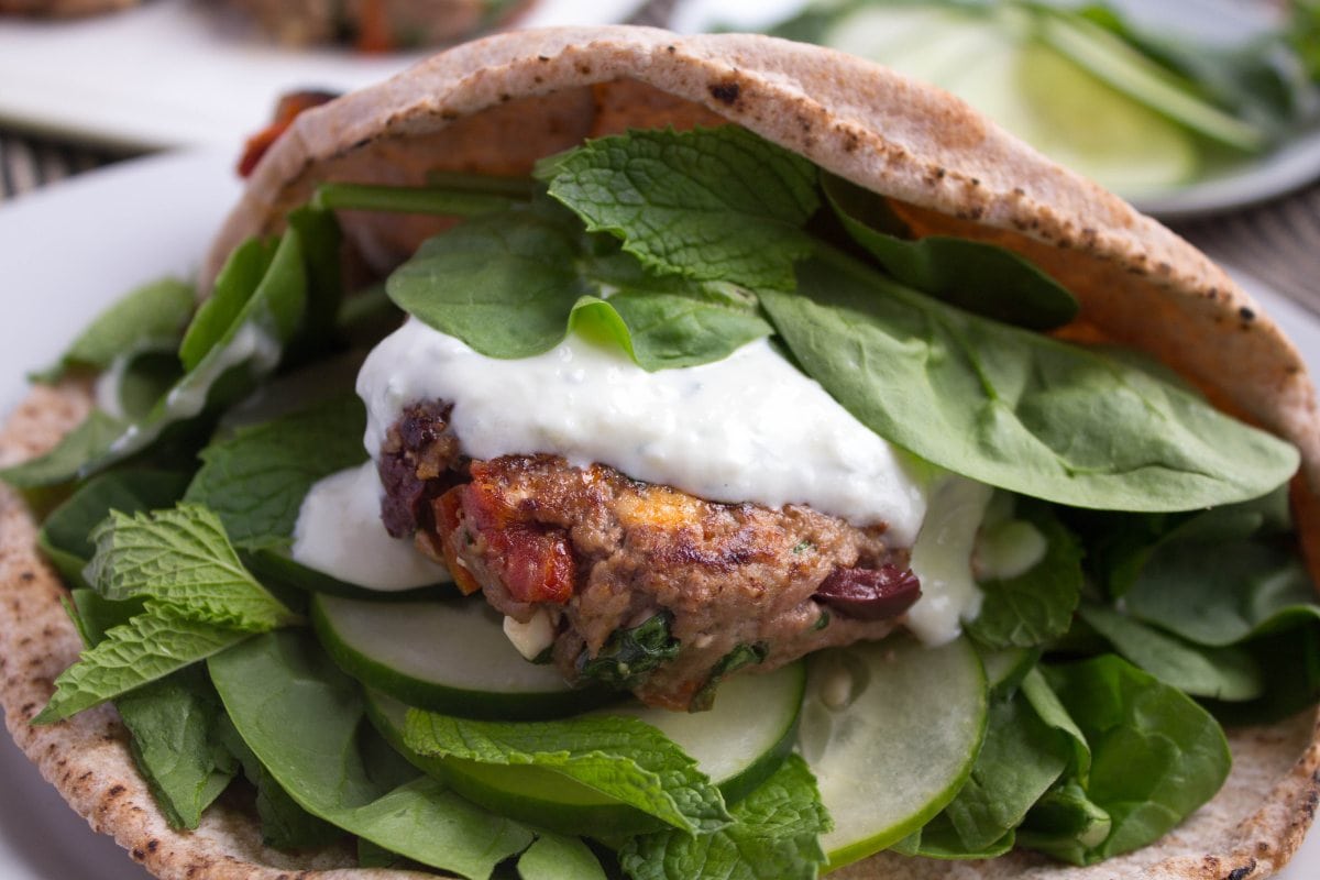 Greek lamb burgers with yogurt sauce in pita bread