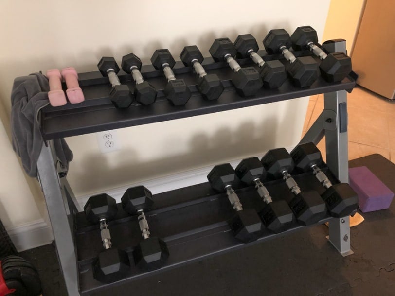 home gym weights on a rack
