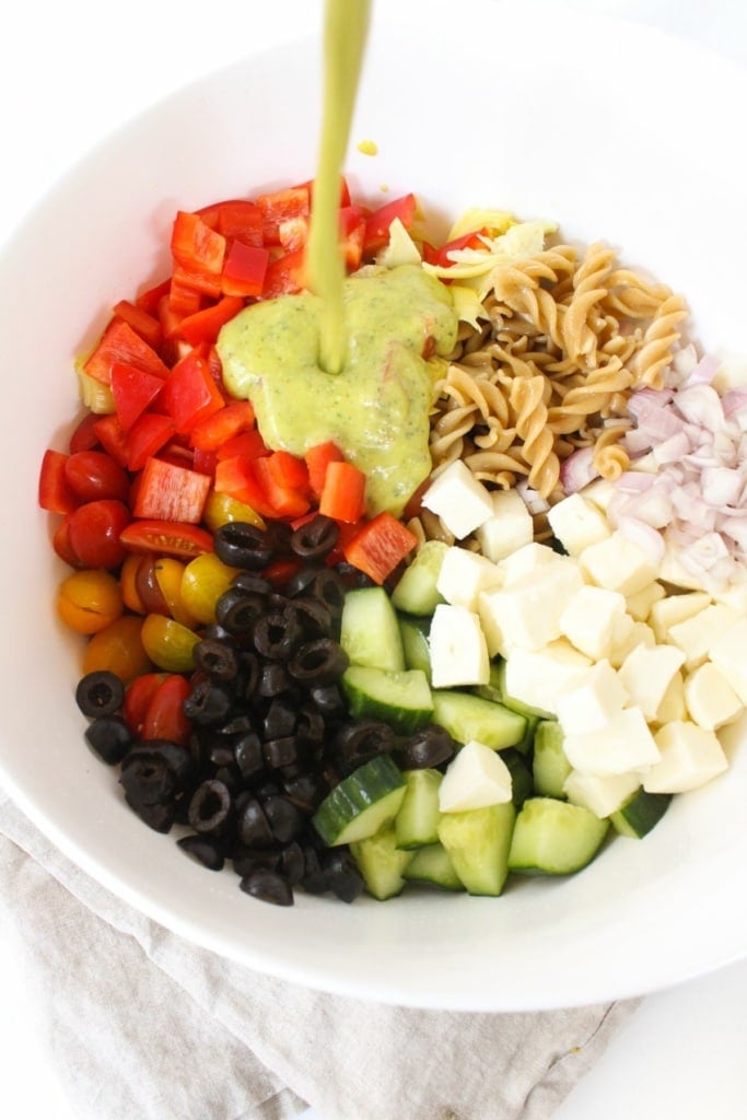 chopped vegetables and pasta in a large bowl