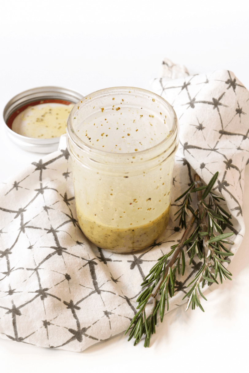 maple dijon apple cider dressing in a jar