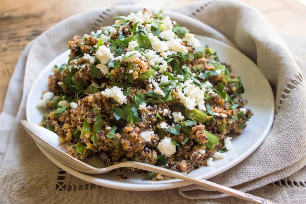 pumpkin quinoa salad with herbs on a plate