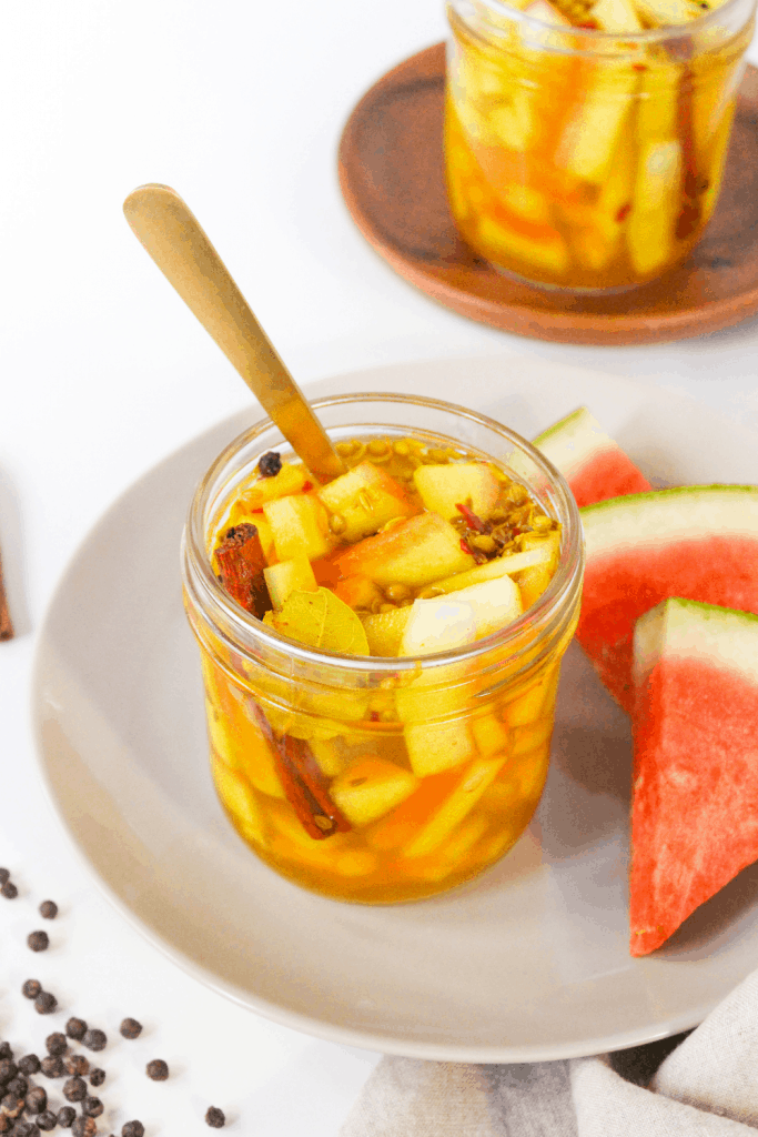 masala spiced watermelon rind pickles in a jar