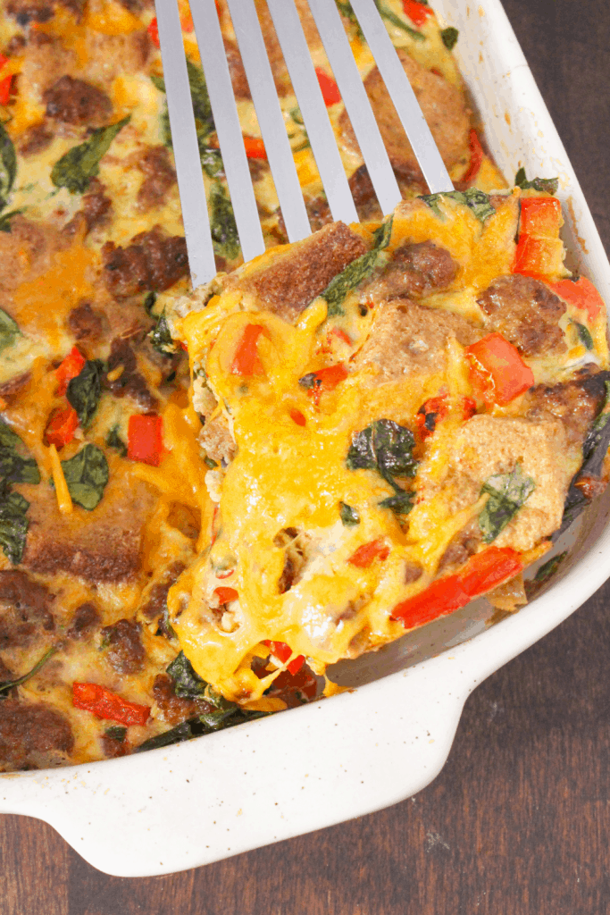 sausage egg casserole in a white baking dish