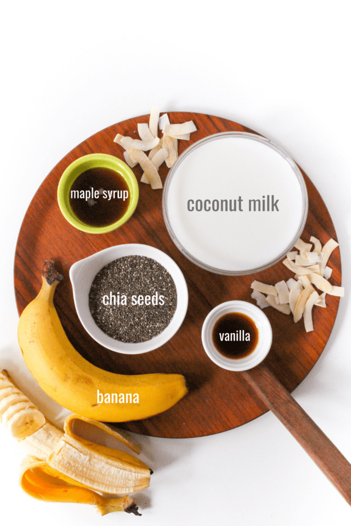 banana chia pudding ingredients: coconut milk, chia seeds, banana, maple syrup, vanilla extract, and unsweetened shredded coconut or coconut flakes