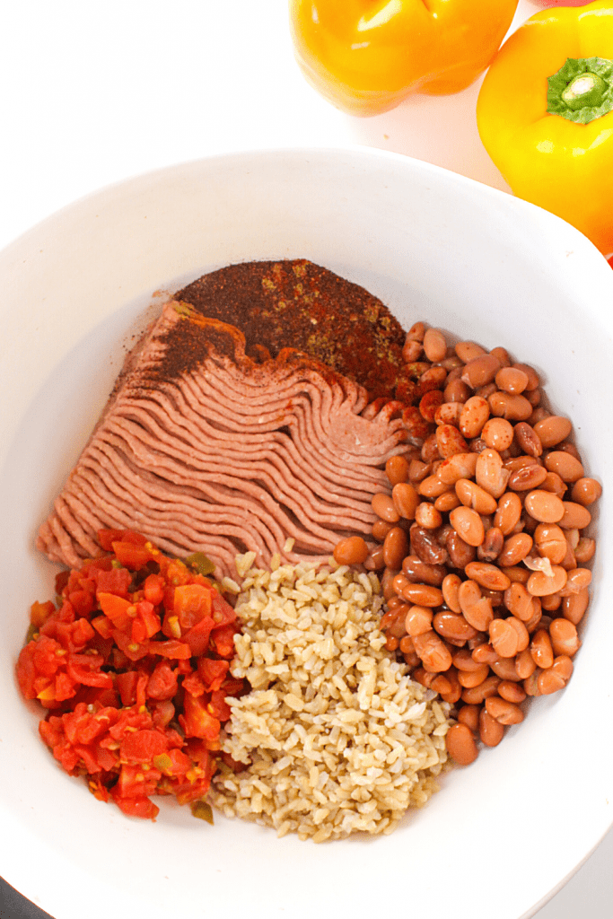 stuffed peppers filling ingredients in a white bowl