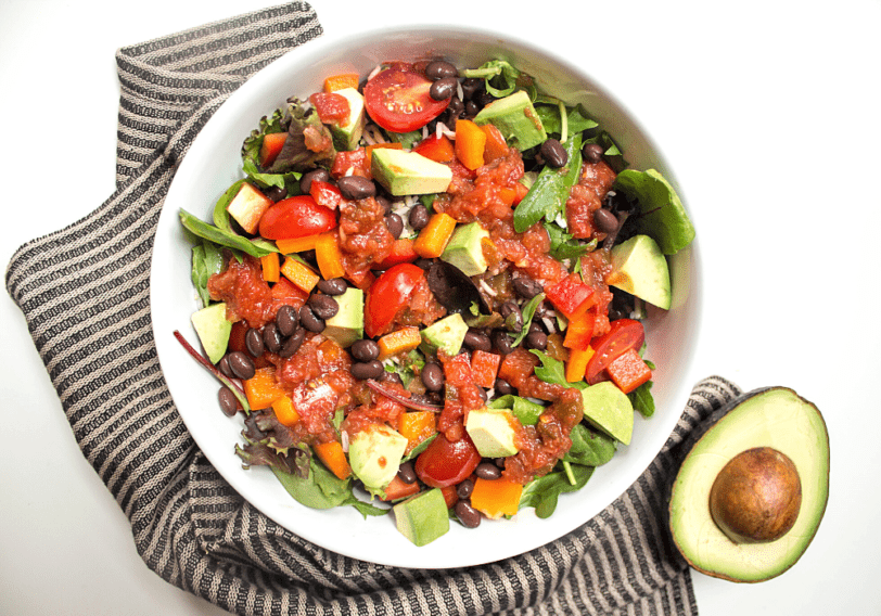 mexican brown rice salad bowl with avocado