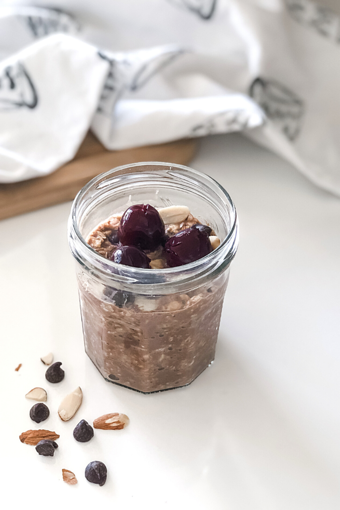 cherry chocolate oatmeal in a mason jar