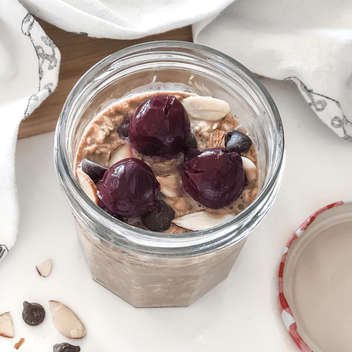 cherry chocolate overnight oats in a jar