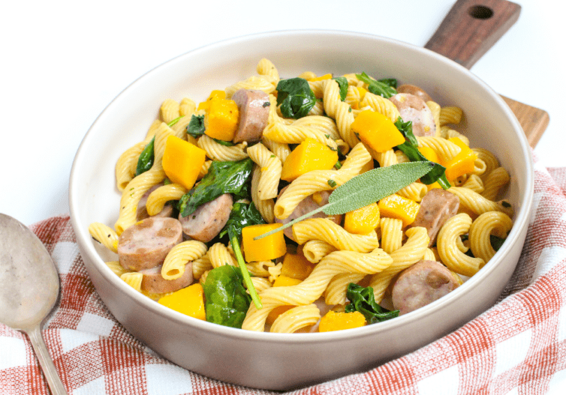 chickpea spiral pasta with sausage and veggies in a bowl
