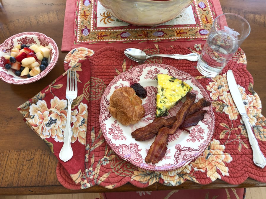 bacon, goat cheese frittata, croissant, and fruit