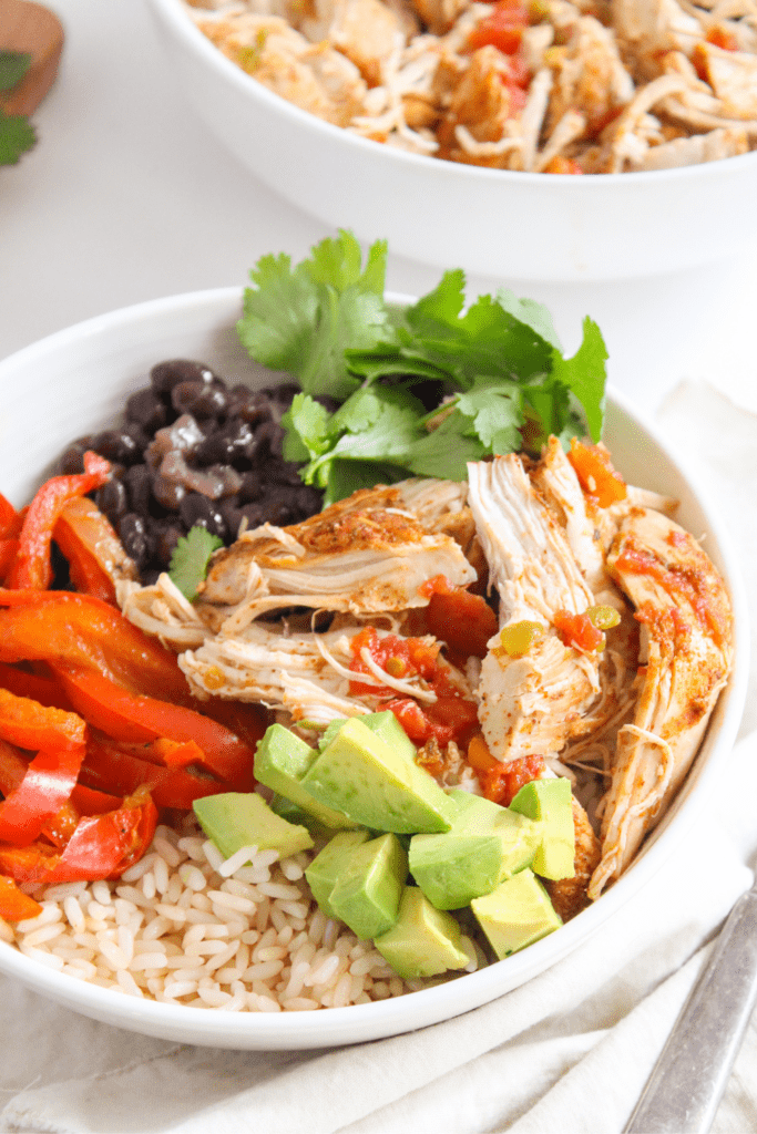 Instant Pot Mexican chicken close up in a burrito bowl