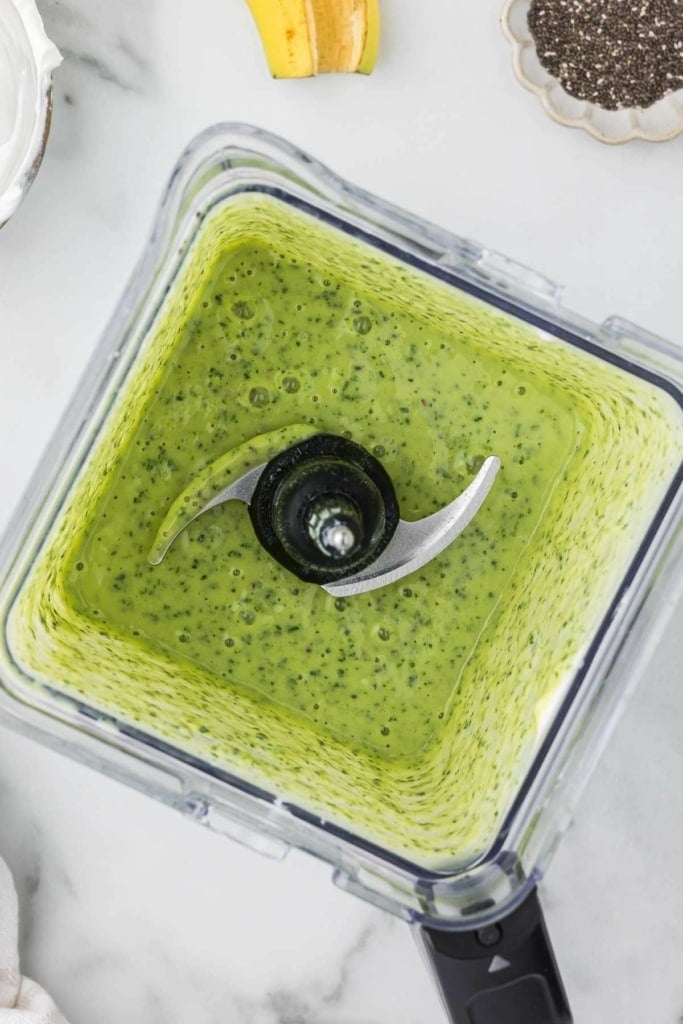 a green smoothie in a blender