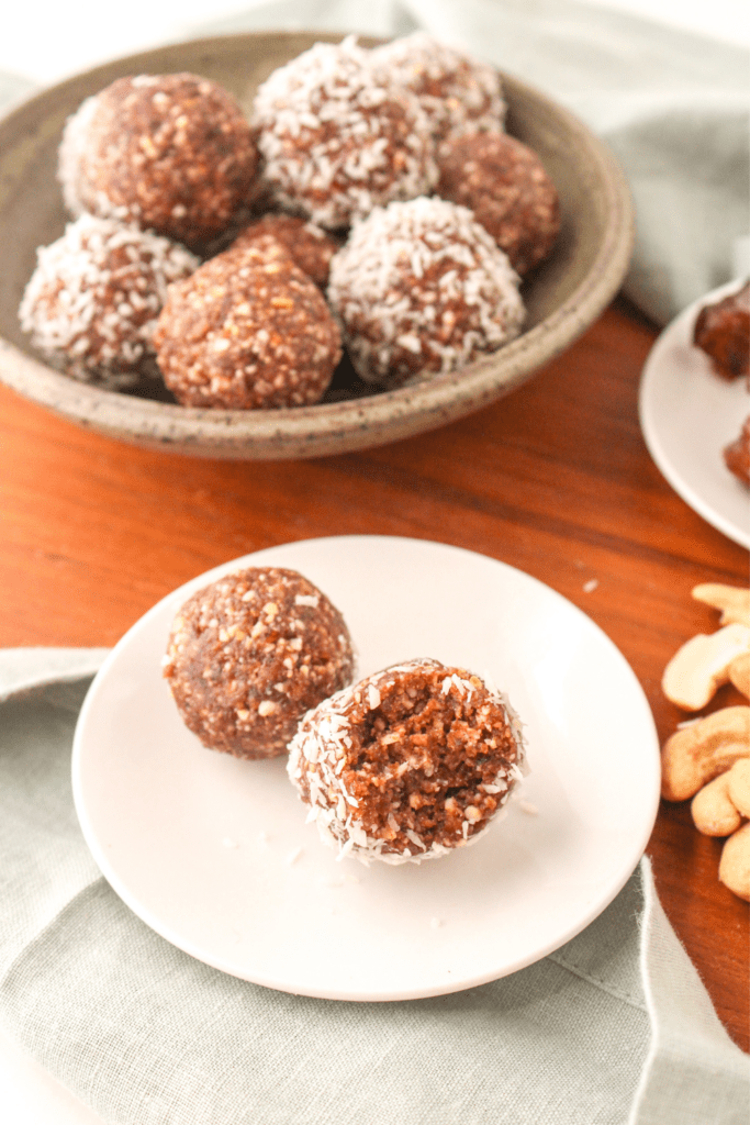 chocolate coconut bliss balls in a bowl